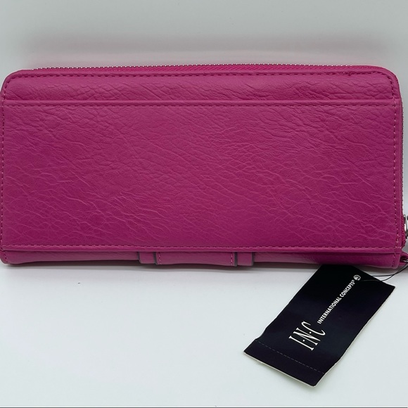 INC International Concepts
Hazell Zip Around Handbag Pink Faux LeatherWristlet - Picture 4 of 11